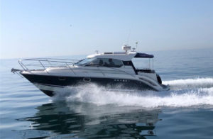 Motorboat cruising at speed on a calm sea