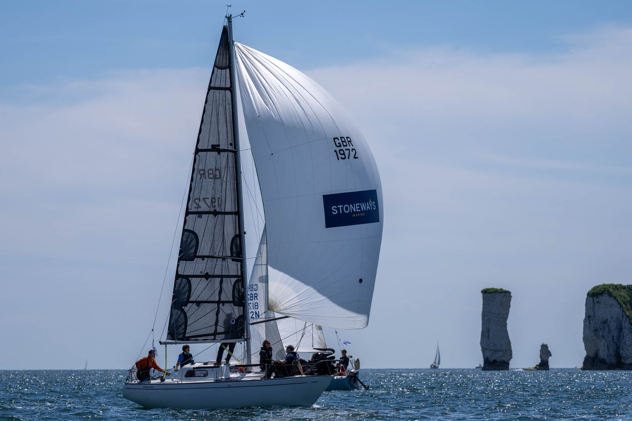 Stoneways QT yacht sailing under the shadow of Old Harry's Rock in Dorset at Poole Regatta 2024